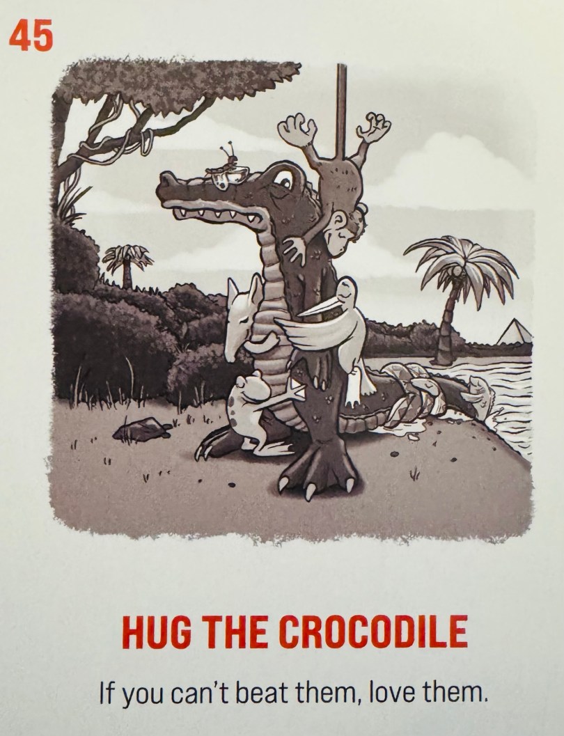 Card #45: Hug The Crocodile. Caption reads: "If you can't beat them, love them." The image shows a crocodile standing on a beach, looking confused, as several animals hugging it from all sides (birds, frogs, snakes, fish, a monkey, a butterfly).